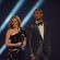 Kylie Minogue y Pharrell Williams presentan uno de los galardones de los Brit Awards 2014