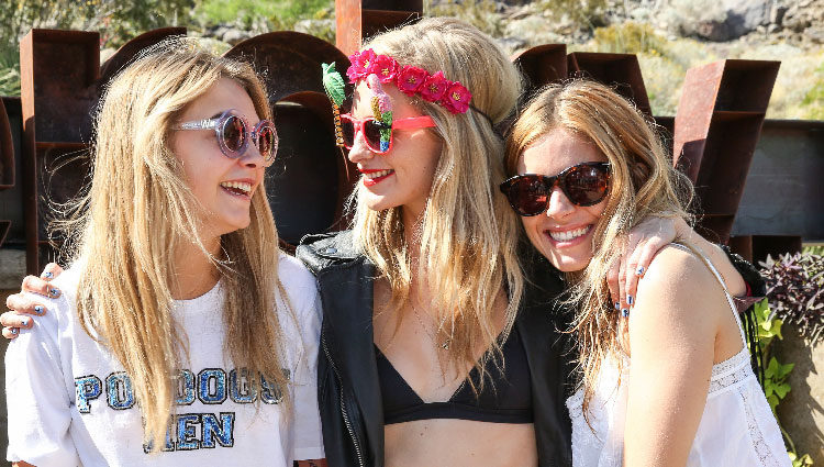 Cara Delevingne, Poppy Delevingne y Sienna Miller en el festival de música Coachella 2014