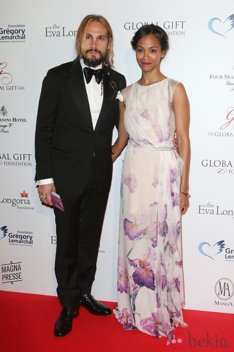 Zoe Saldaña y Marco Perego en la Global Gift Gala 2014 de París