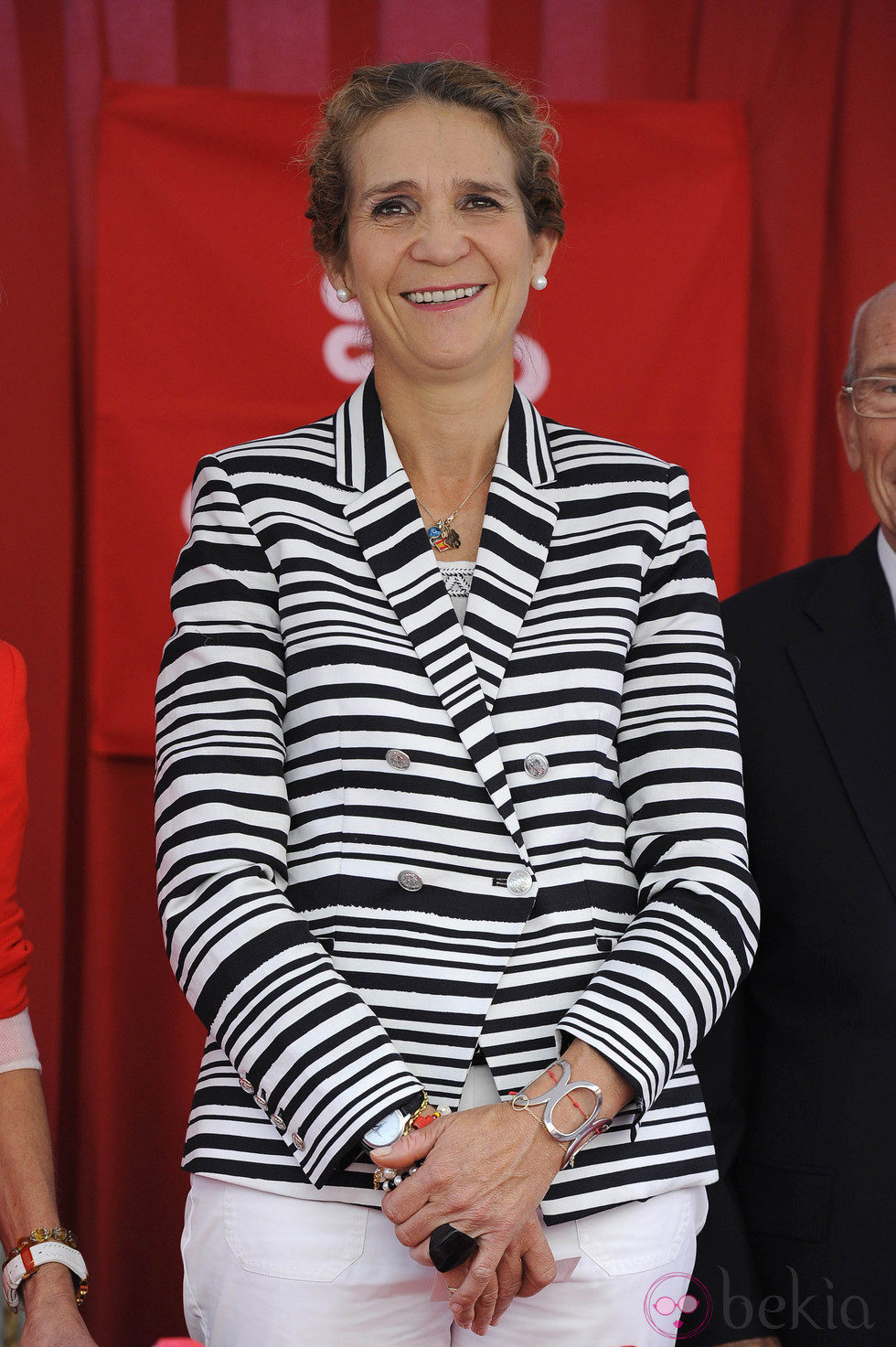 La Infanta Elena, muy sonriente en su último acto oficial como miembro de la Familia Real