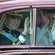 El Rey Felipe VI y la Reina Letizia saludan durante el recorrido hasta el Congreso de los Diputados