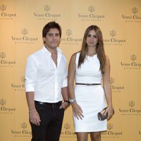 Leo Perrugoría y Elena Furiase en un torneo de golf en La Moraleja