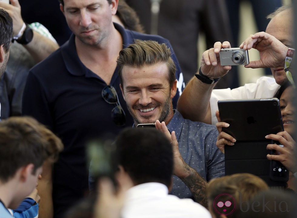 David Beckham fotografía a Pelé en la final del Mundial 2014