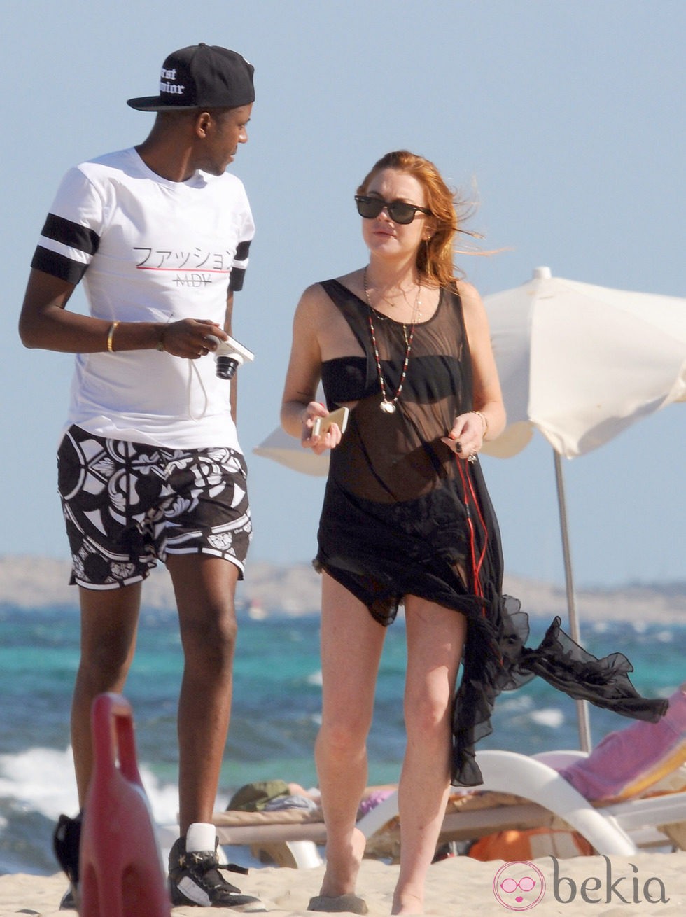 Lindsay Lohan con un amigo en Ibiza