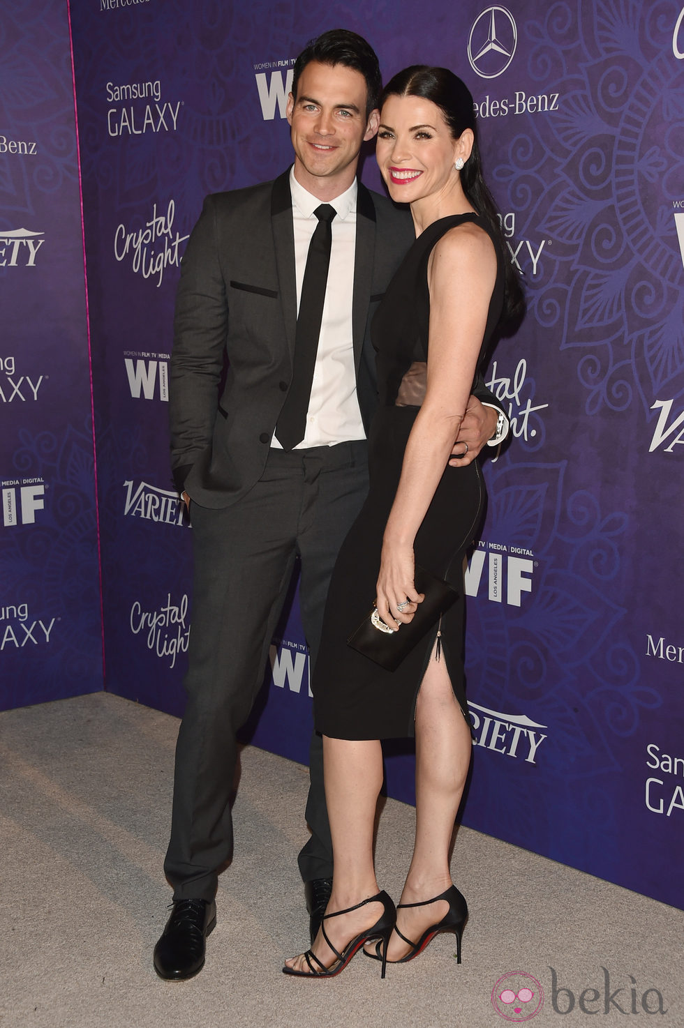 Julianna Margulies y Keith Lieberthal en una fiesta previa a la entrega de los Premios Emmy 2014
