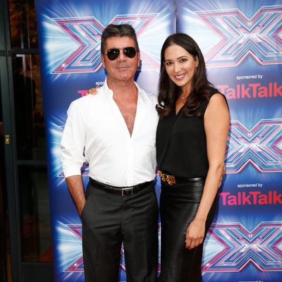 Simon Cowell y Lauren Silverman en la presentación de la 11 edición de 'The X Factor'