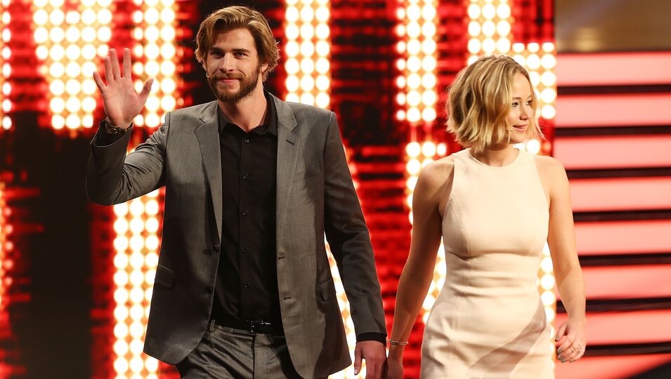 Jennifer Lawrence y Liam Hemsworth presentando Sinsajo en Austria