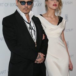 Johnny Depp y Amber Heard en la presentación de 'The Art of Elysium'