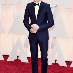 Eddie Redamyne posa a su llegada a la alfombra roja de los Oscar 2015