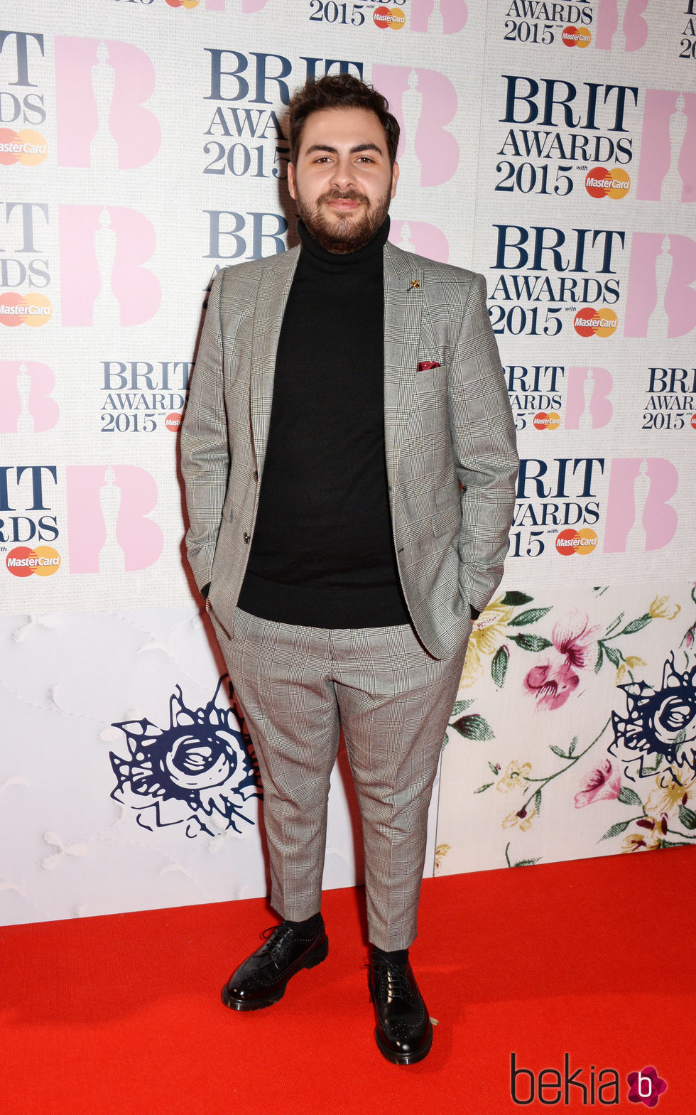 Andrea Faustini en la alfombra roja de los Brit Awards 2015