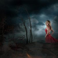 Edurne con un vestido rojo en el videoclip de 'Amanecer'