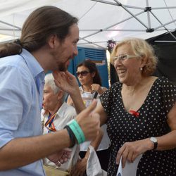 Manuela Carmena y Pablo Iglesias en el desfile del Orgullo Gay 2015