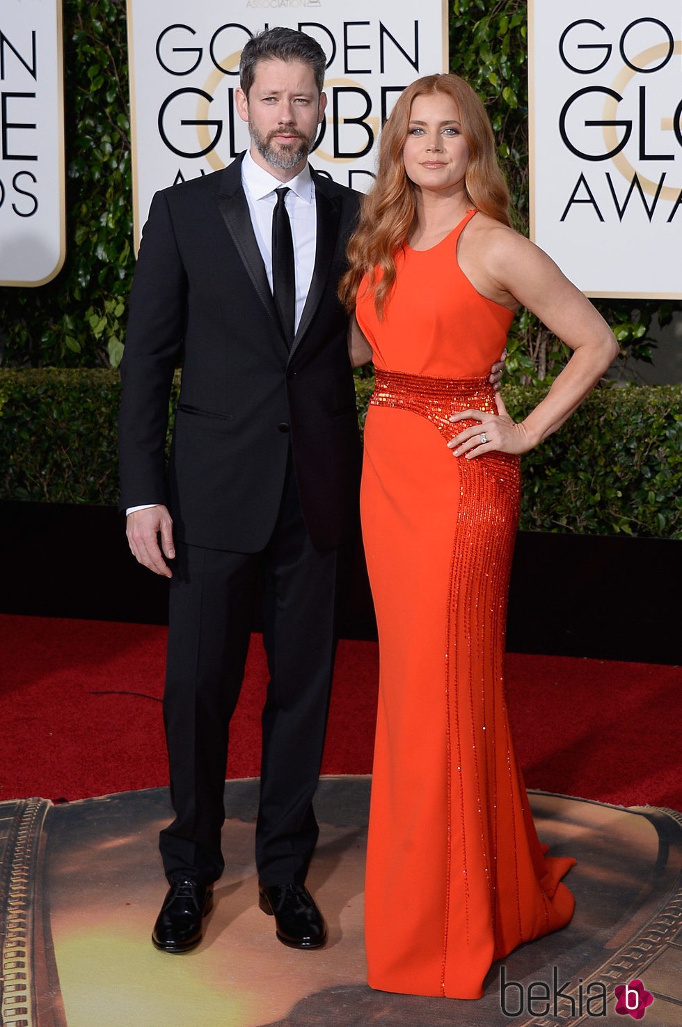 Amy Adams y Darren Le Gallo en la alfombra roja de los Globos de Oro 2016