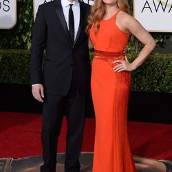 Amy Adams y Darren Le Gallo en la alfombra roja de los Globos de Oro 2016