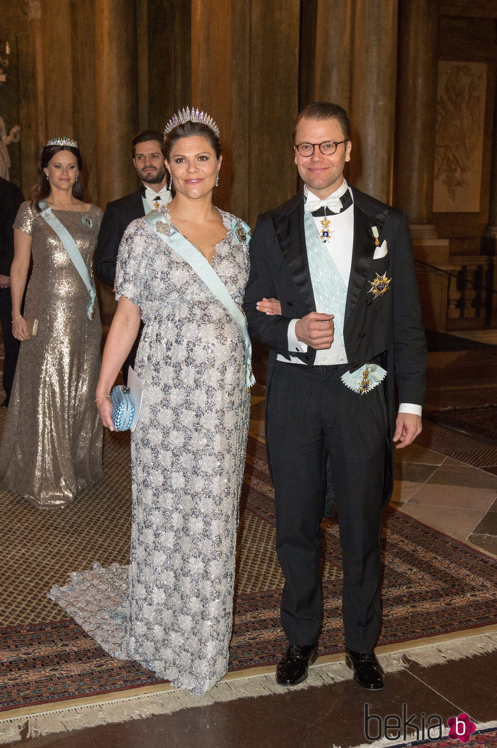 La Princesa Victoria de Suecia luciendo embarazo con Daniel de Suecia en una cena de gala