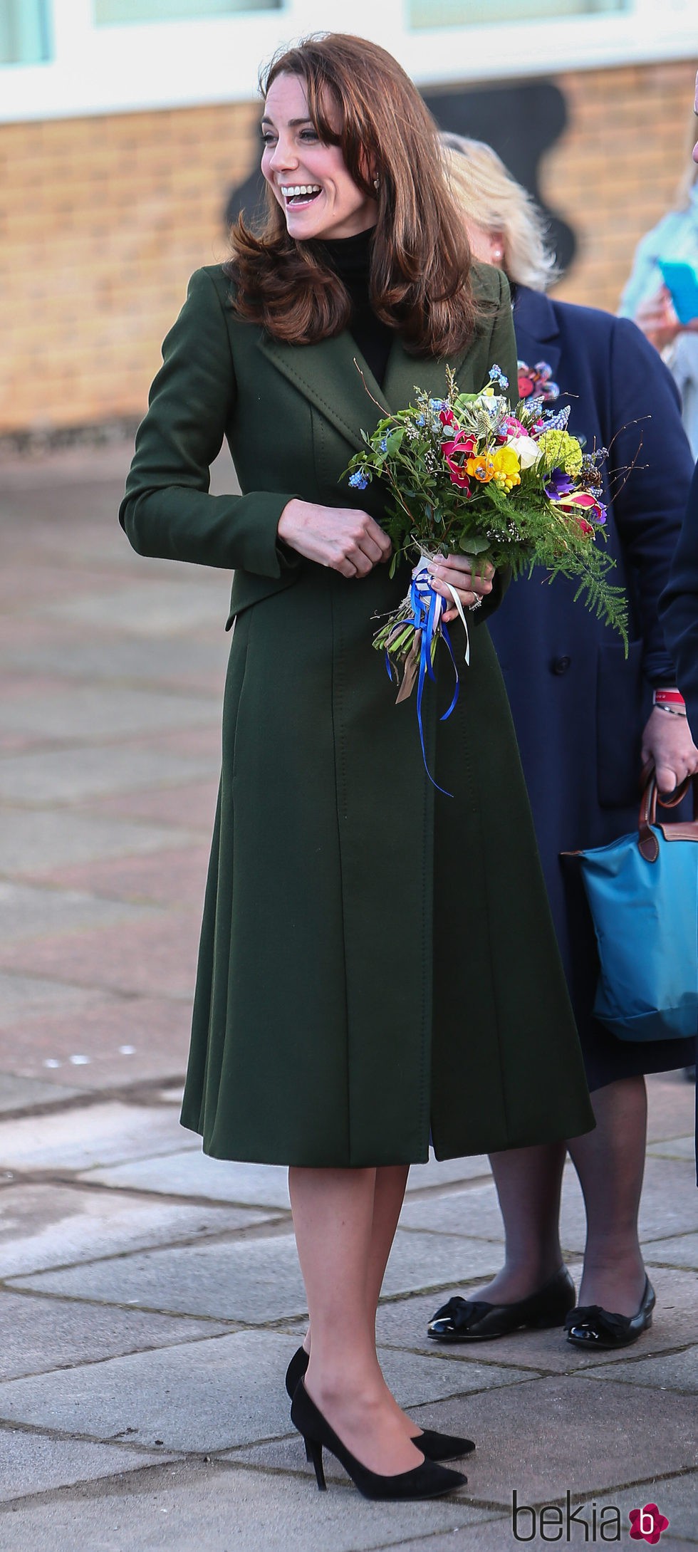 Kate Middleton, sonriente en su visita a una escuela en Londres