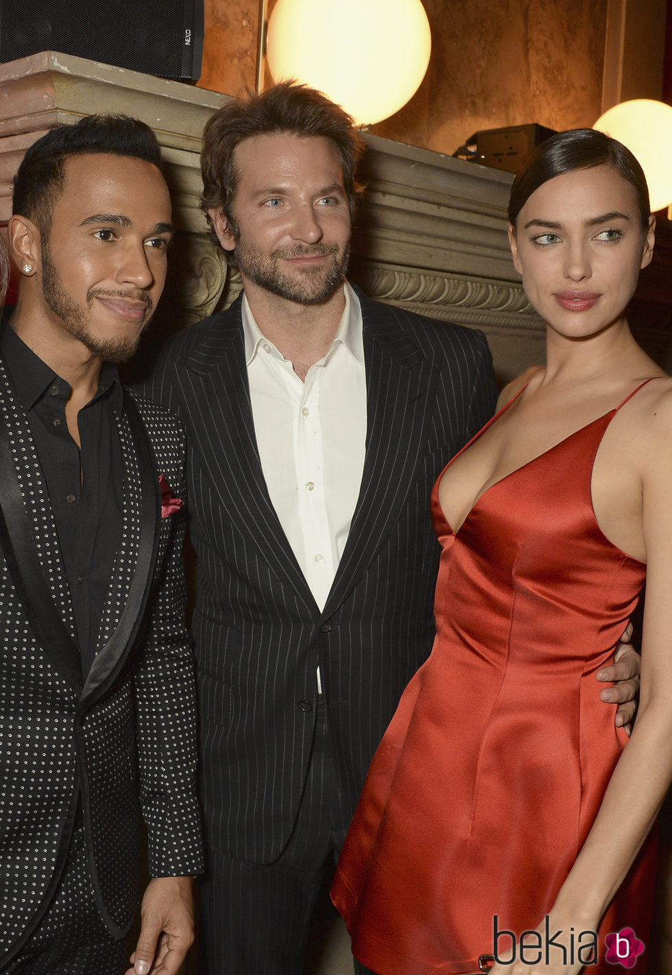 Lewis Hamilton, Bradley Cooper e Irina Shayk en la fiesta L'Oreal Paris Red Obsession