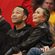 Chrissy Teigen y John Legend en un partido de la NBA