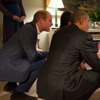 Barack y Michelle Obama conocen al Príncipe Jorge en Kensington Palace