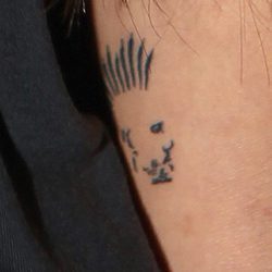 Tatuaje que Cristina Pedroche tiene en el brazo con la cara de David Muñoz